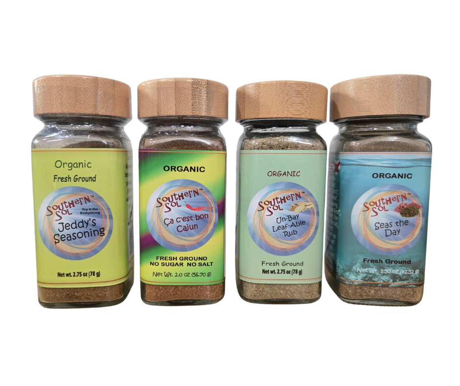 Four bottles of Southern Style & Spice organic seasonings on a white background